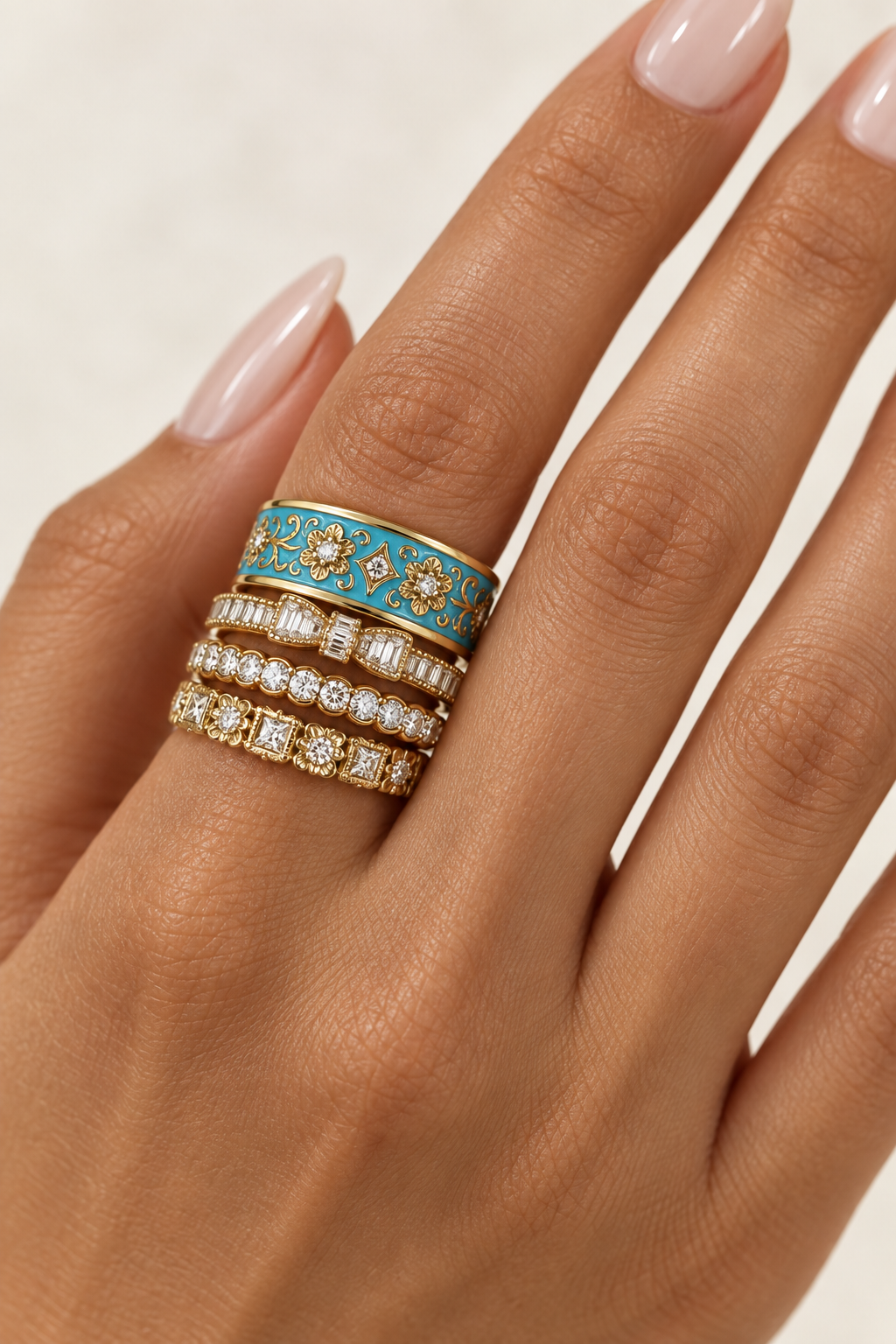 4 Rings Stacked on One Finger